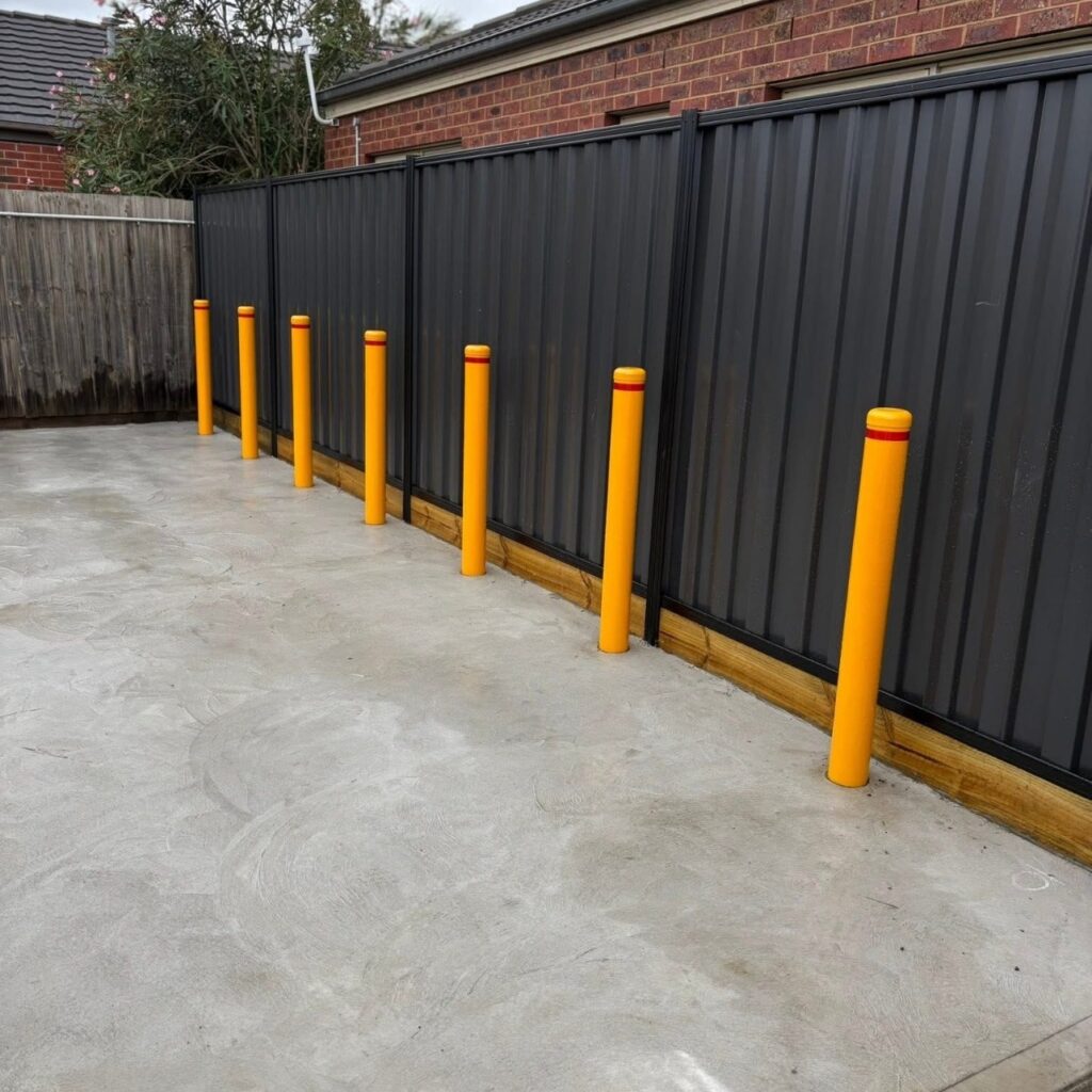 steel bollards installed in a commercial carpark in Traralgon, Gippsland for building protection